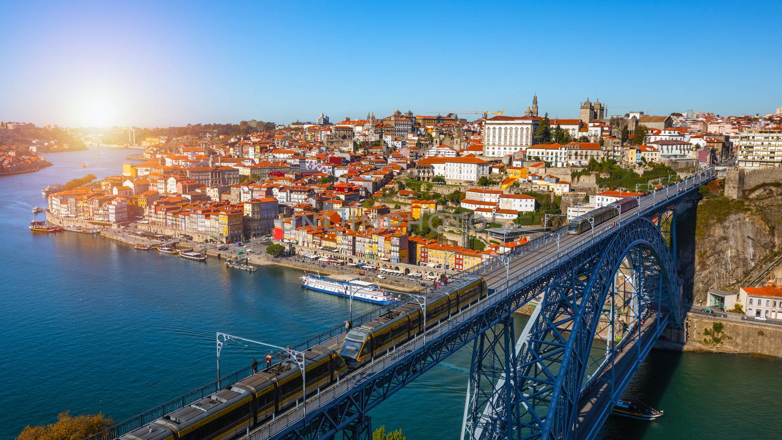Panoramic view of Old city of Porto (Oporto) and Ribeira over Douro river, Portugal. Concept of world travel, sightseeing and tourism.