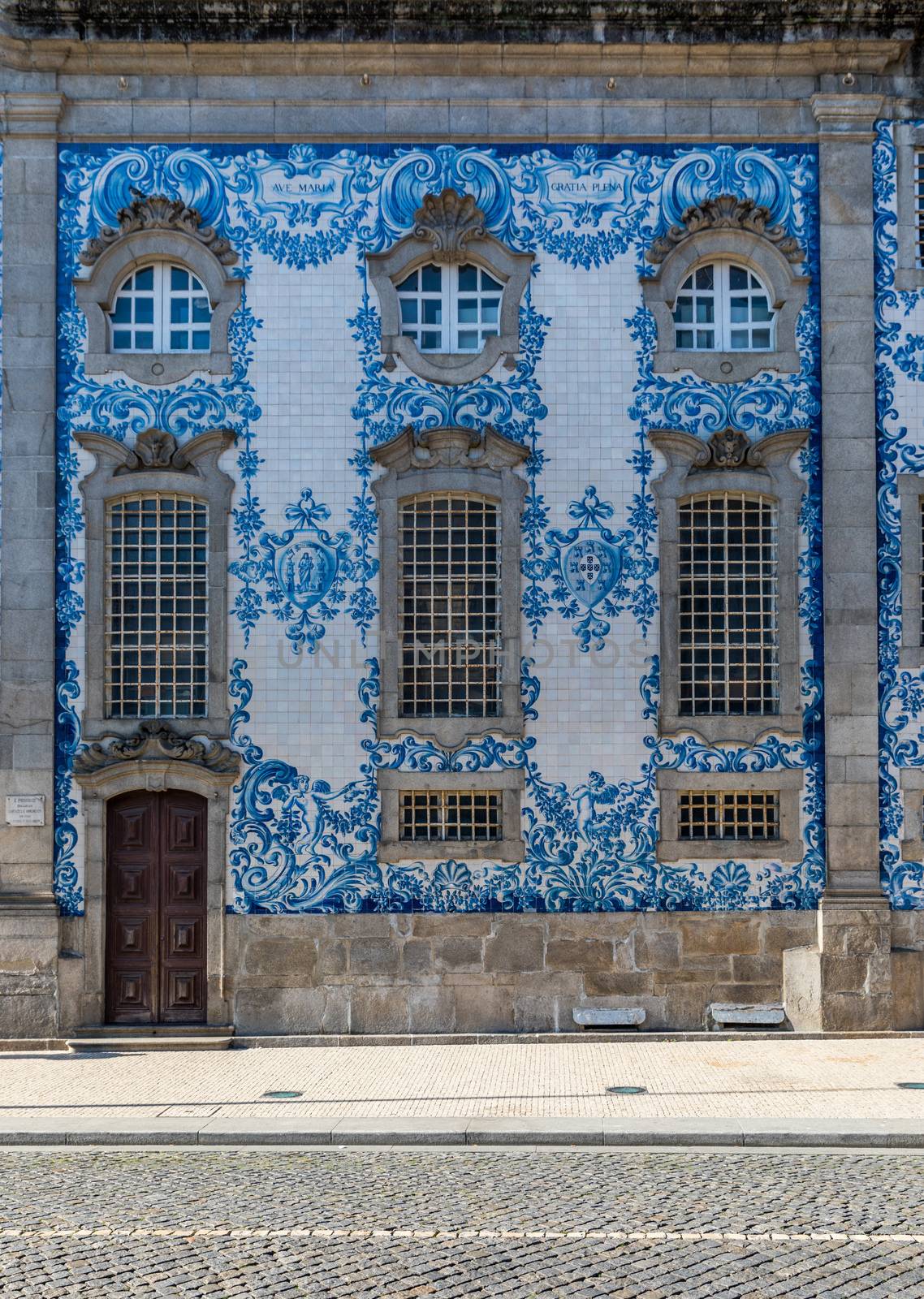 Traditional historic facade in Porto decorated with blue hand painted tin-glazed tiles, Oporto, Portugal