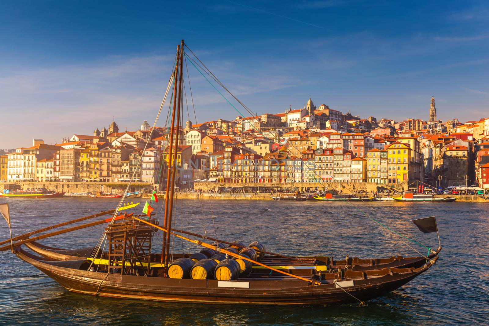 Oporto or Porto city skyline, Douro river, traditional boats and Dom Luis or Luiz iron bridge. Porto, Portugal, Europe.