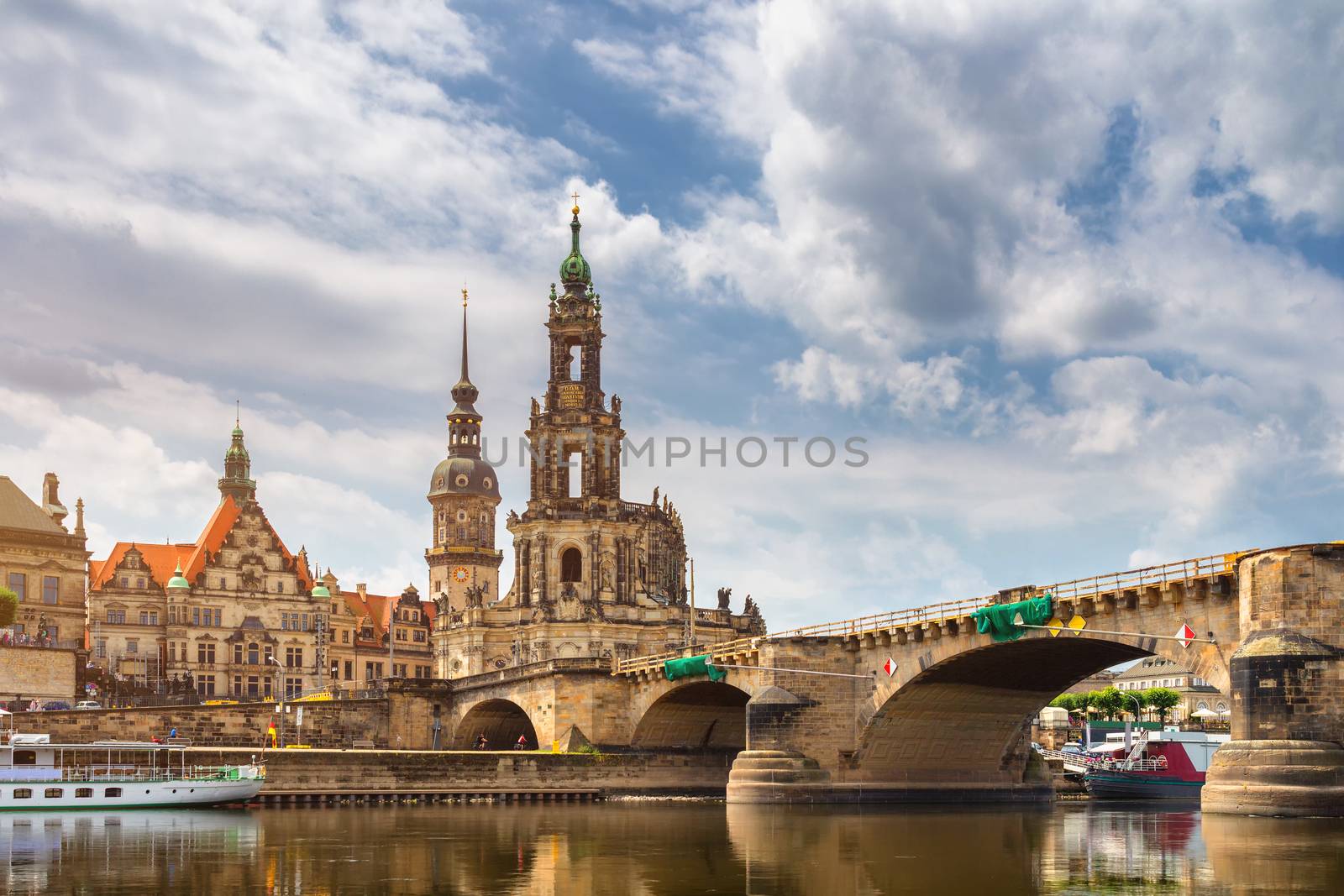 Augustus Bridge (Augustusbrucke) and Cathedral of the Holy Trinity (Hofkirche) over the River Elbe in Dresden, Germany, Saxony.