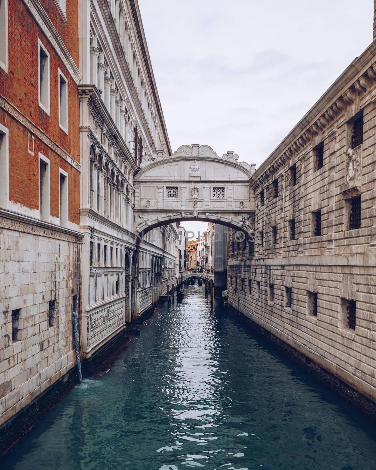View of the Bridge of Sighs (Ponte dei Sospiri) and the Rio de Palazzo o de Canonica Canal from the Riva degli Schiavoni in Venice, Italy. The Ponte de la Canonica is visible in background.