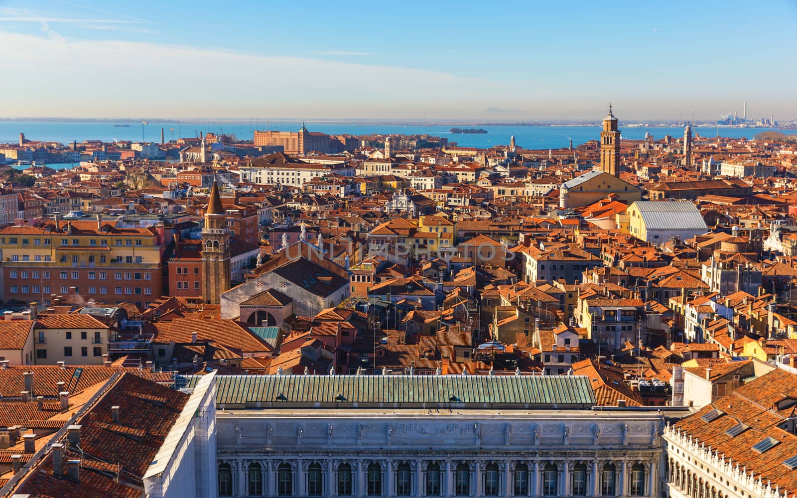 Venice panoramic aerial view with red roofs, Veneto, Italy. Aerial view of the Venice city, Italy. Venice is a popular tourist destination of Europe. Venice, Italy.