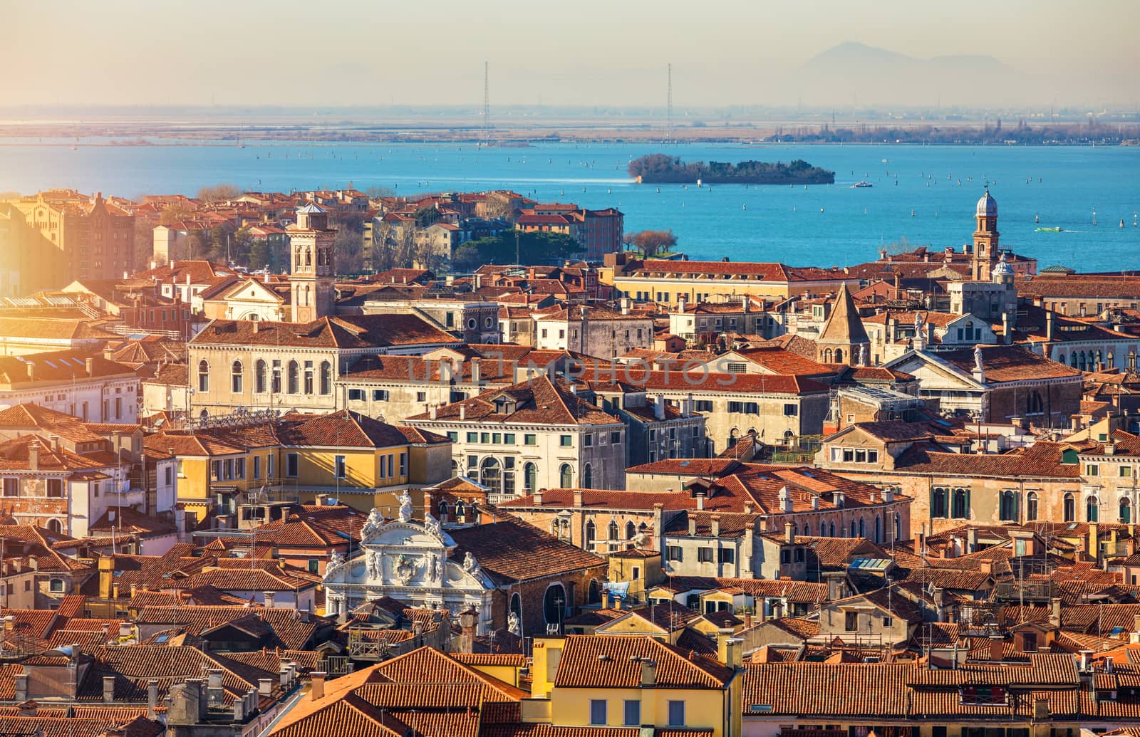 Venice panoramic aerial view with red roofs, Veneto, Italy. Aerial view of the Venice city, Italy. Venice is a popular tourist destination of Europe. Venice, Italy.