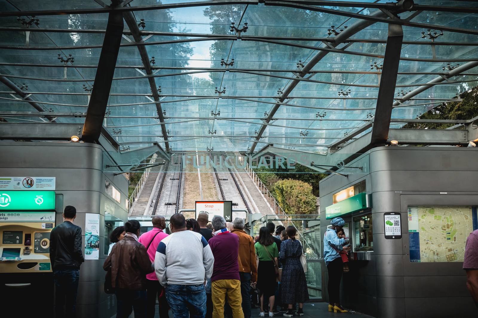 Paris, France - October 6, 2018: people who wait for the next funicular in the station to climb on the Montmartre