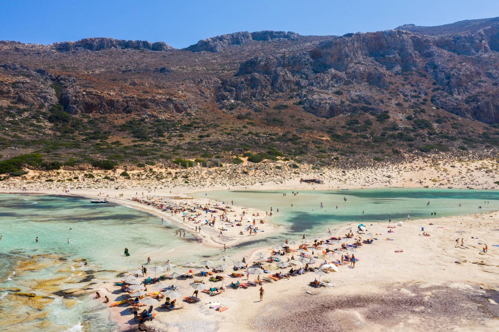 Aerial view of Balos beach near Gramvousa island in Crete. Magical turquoise waters, lagoons, Balos beach of pure white sand. Balos bay in Crete island, Greece.
