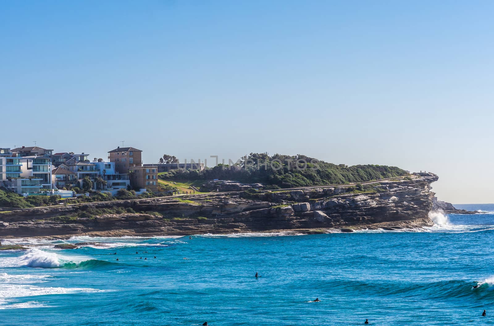 North cliff of Bronte Beach seen from South shore cliffs, Sydney by Claudine