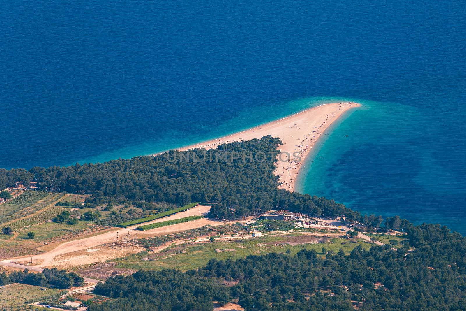 Beautiful panorama of famous Adriatic beach Zlatni Rat (Golden Cape or Golden Horn) with turquoise water , Island of Brac Croatia summertime. Famous Adriatic beach Zlatni Rat in Bol, Brac, Croatia.