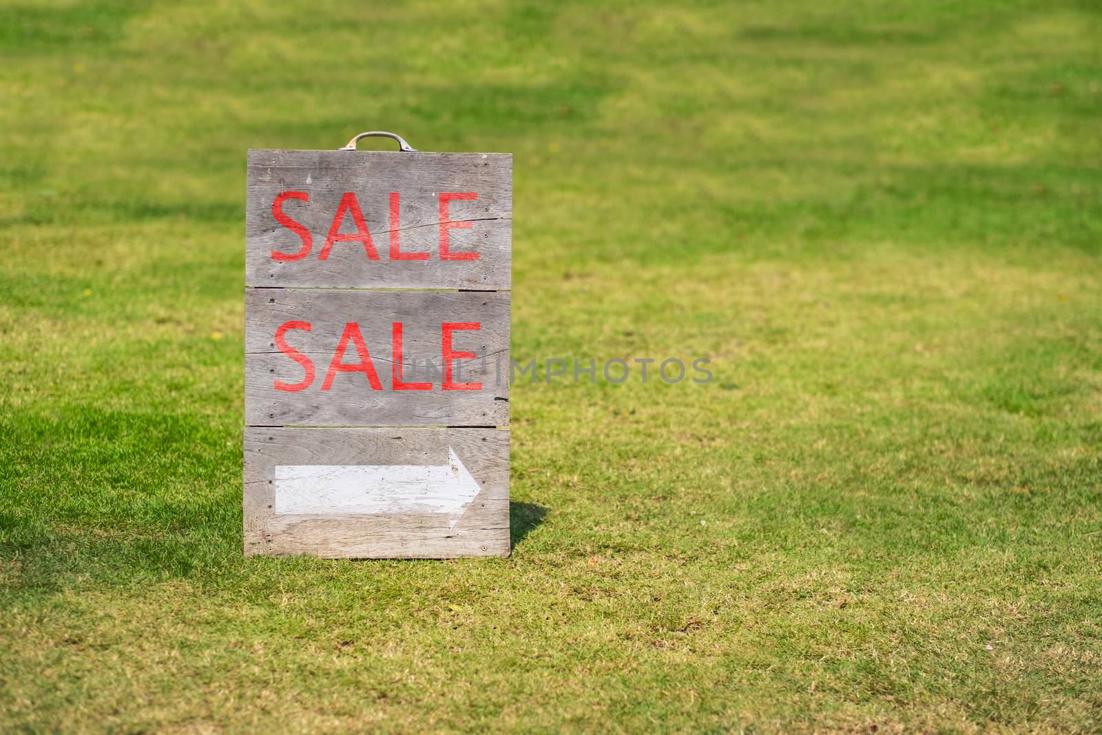 Word sale on wood gardensign by Surasak