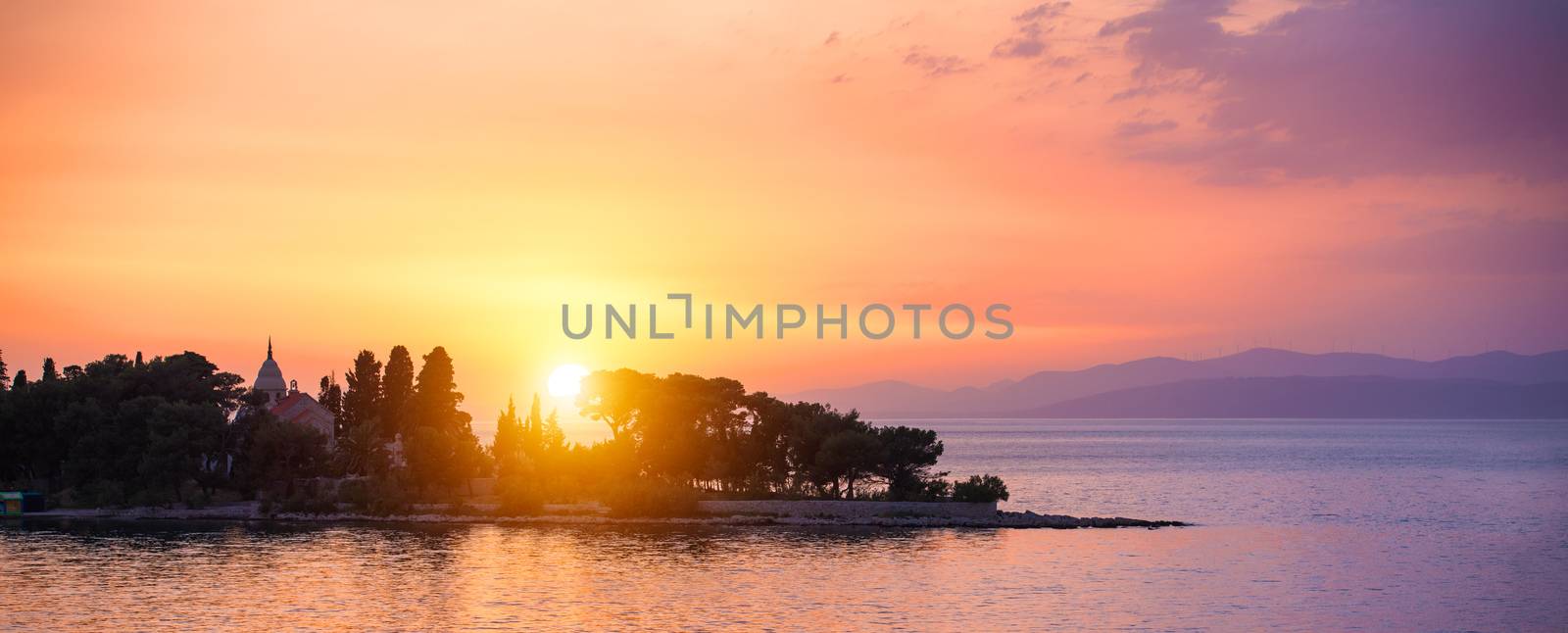 Beautiful sunset or sunrise above the sea. Tropical sunset or sunrise over sea. Colourful sunset or sunrise over water.