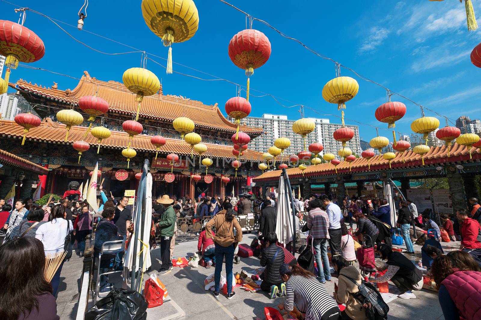 Kowloon, Hong Kong, China - JANUARY 13, 2016: people praying at Sik Sik Yuen Wong Tai Sin Temple,Wong Tai Sin also known as Huang Chu-ping