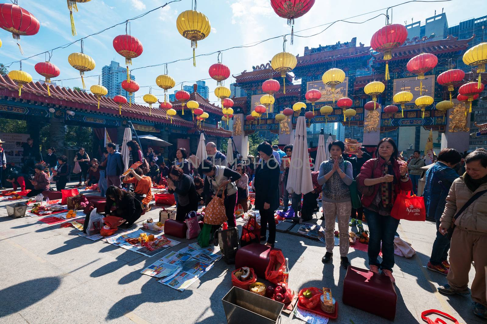 Kowloon, Hong Kong, China - JANUARY 13, 2016: people praying at by Surasak