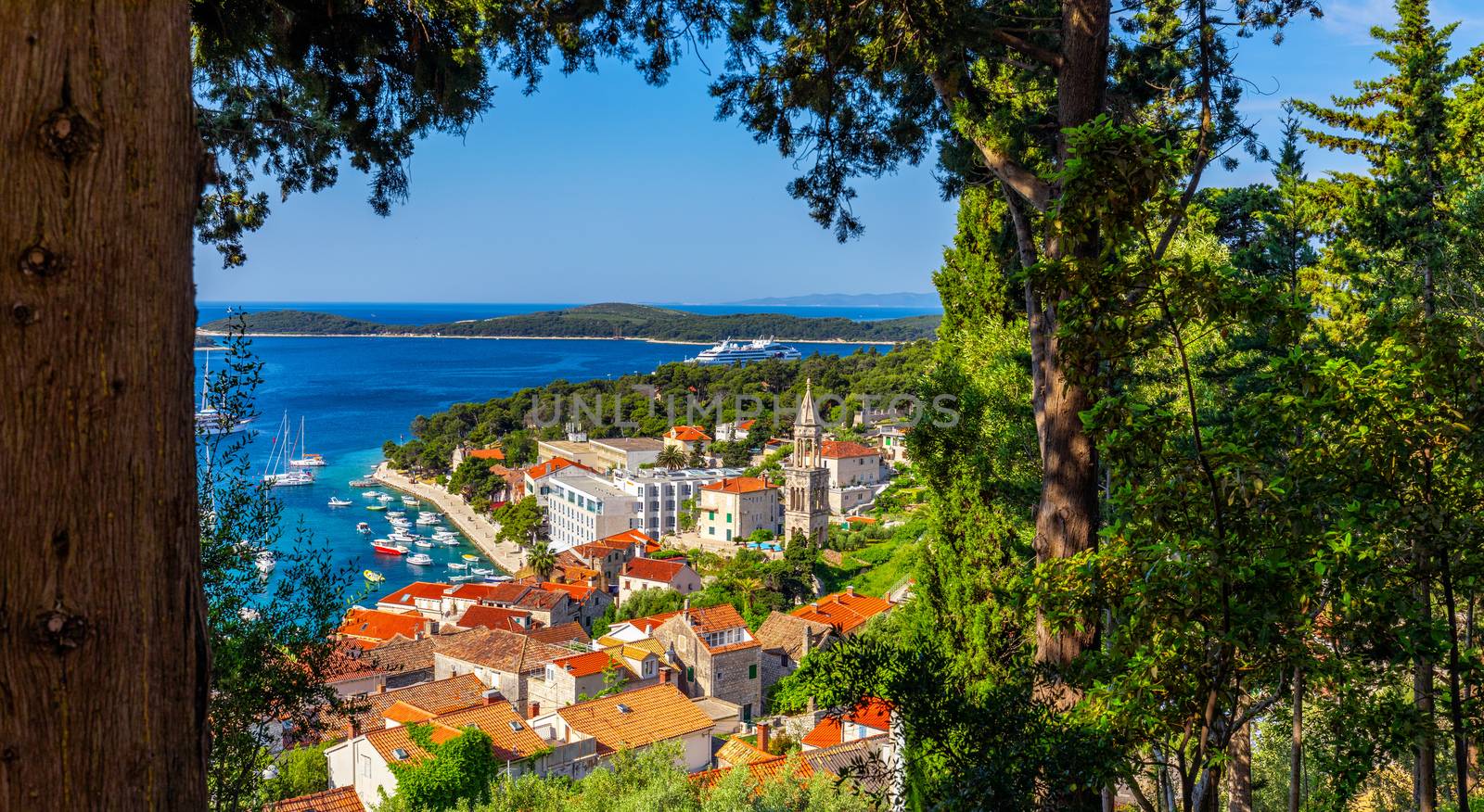 View at amazing archipelago in front of town Hvar, Croatia. Harbor of old Adriatic island town Hvar. Popular touristic destination of Croatia. Amazing Hvar city on Hvar island, Croatia.