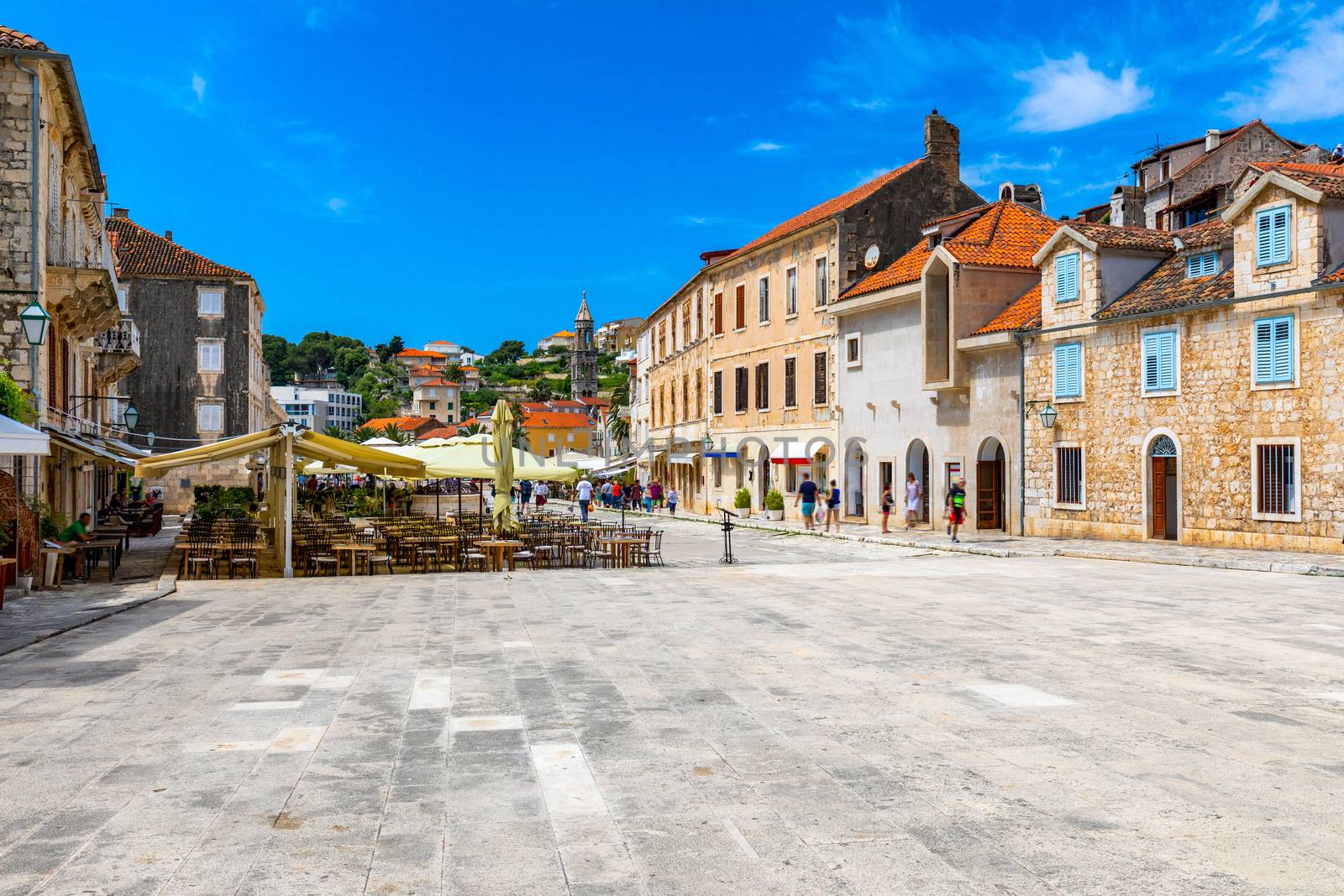Main square in old medieval town Hvar. Hvar is one of most popular tourist destinations in Croatia in summer. Central Pjaca square of Hvar town, Dalmatia, Croatia. 