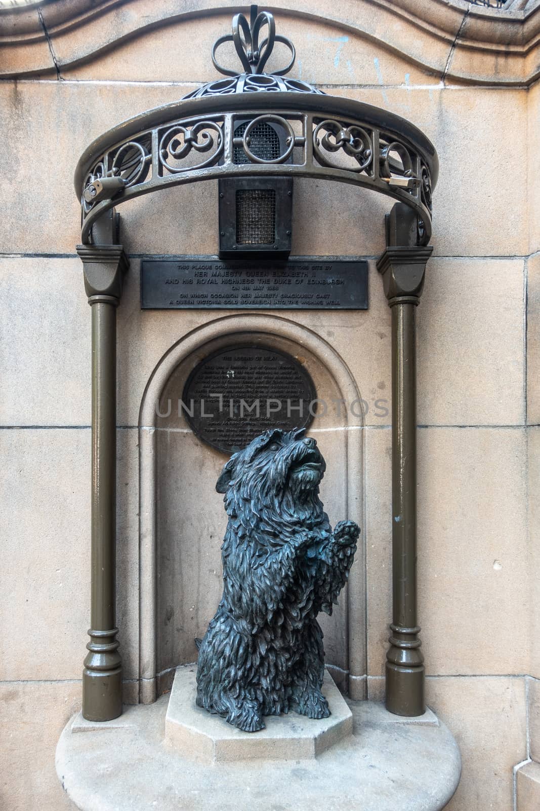 Sydney, Australia - February 12, 2019: Historic bronze statue of pet dog Islay of Queen Victoria called the Legend of. Near her statue in front of Victoria Building and shopping mall.