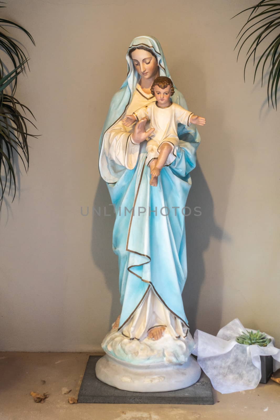 Closeup of Mary and child statue outside Saint Patricks Church, by Claudine