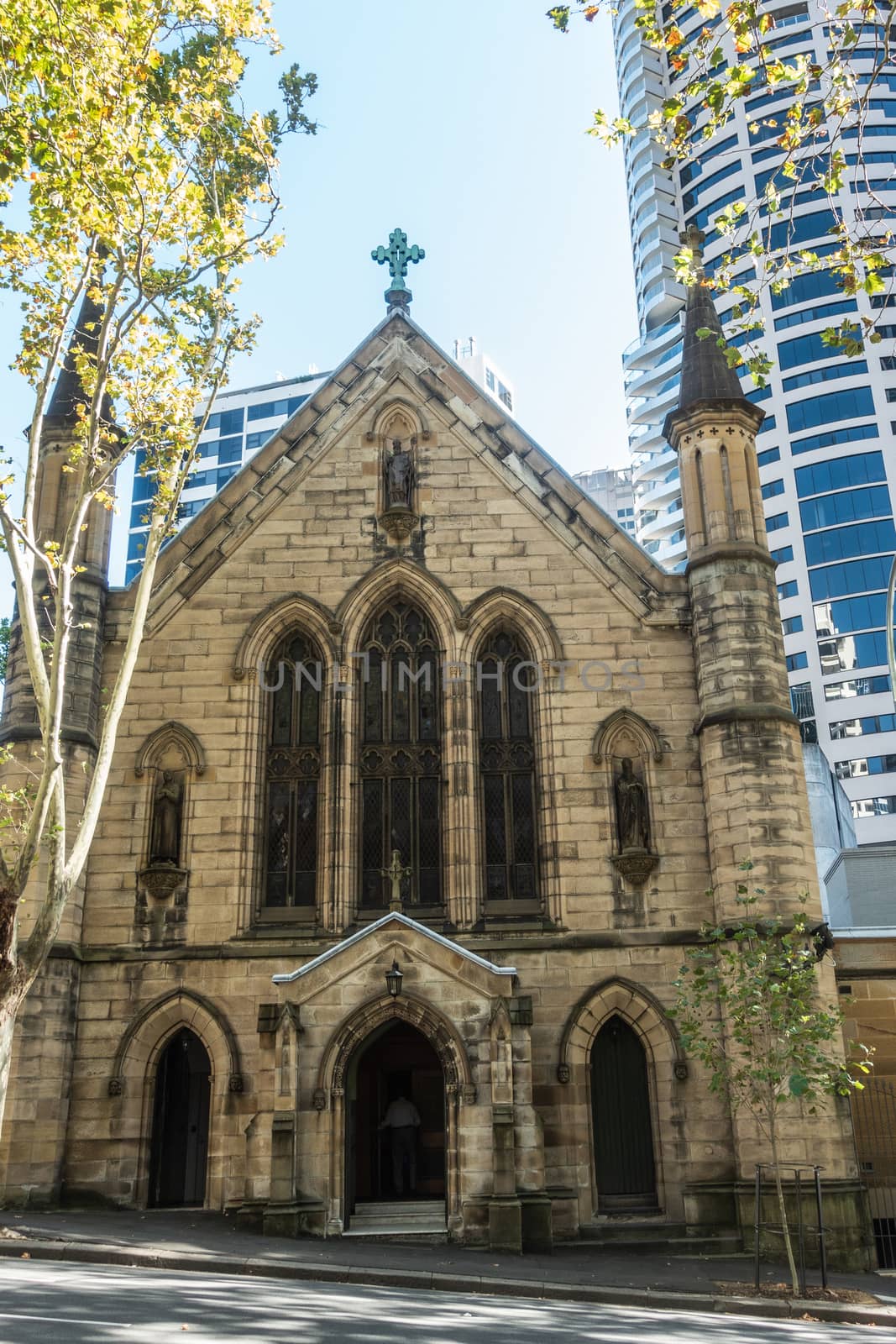 Sydney, Australia - February 12, 2019: Saint Patricks Church on Grosvenor Street opposite of Lang Park. Street view of front facade and entrances.