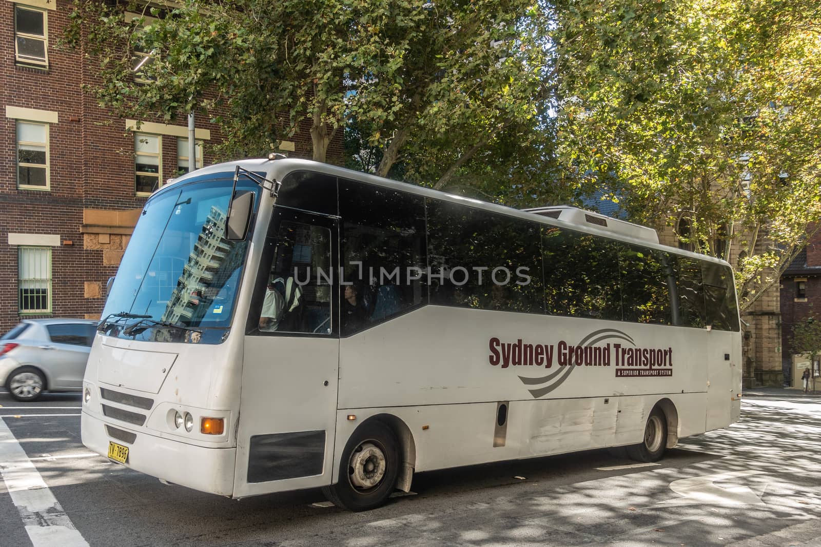 Sydney Ground Transport bus in town, Sydney Australia. by Claudine