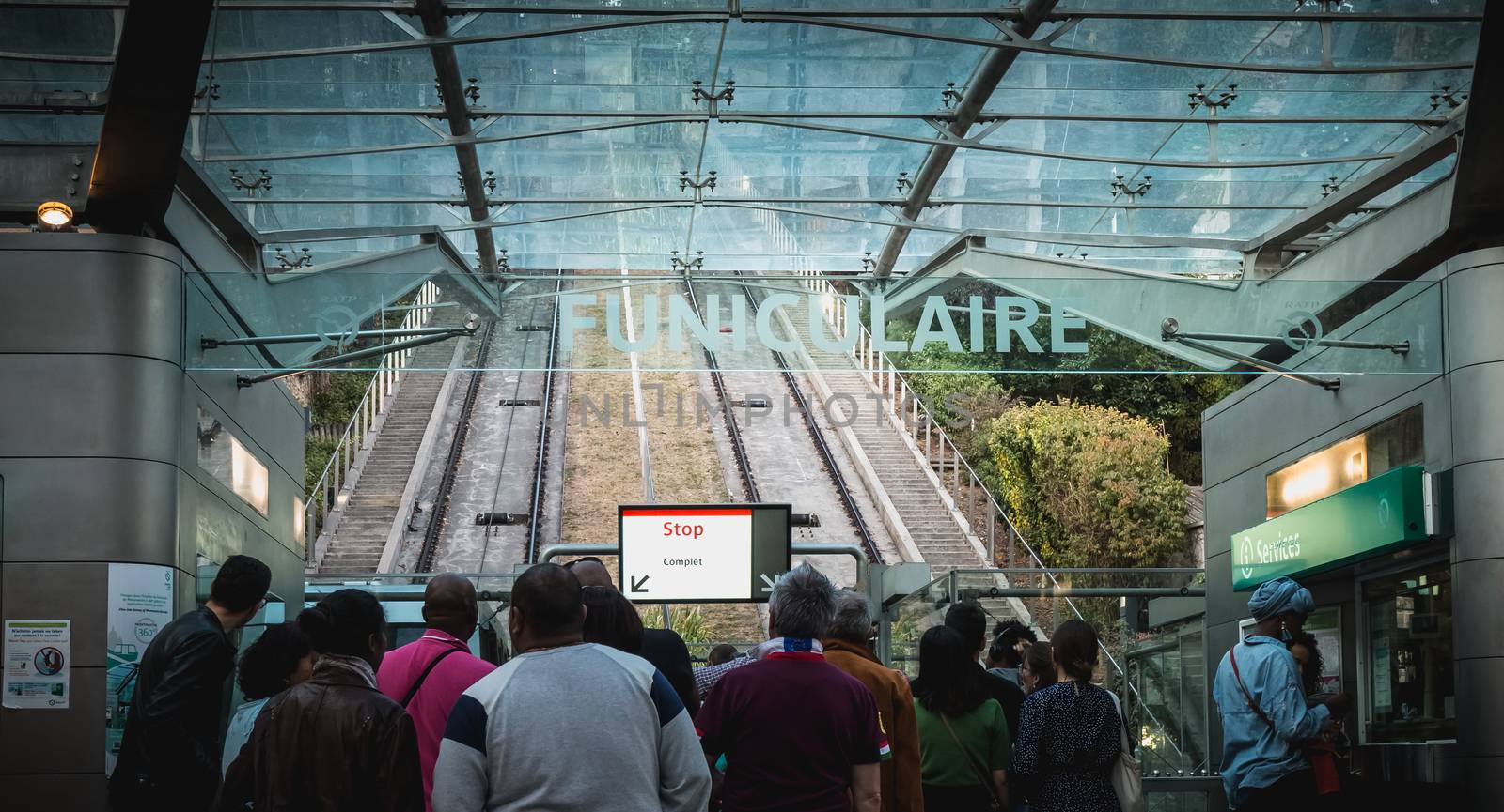 people who wait for the next funicular in the station to climb o by AtlanticEUROSTOXX