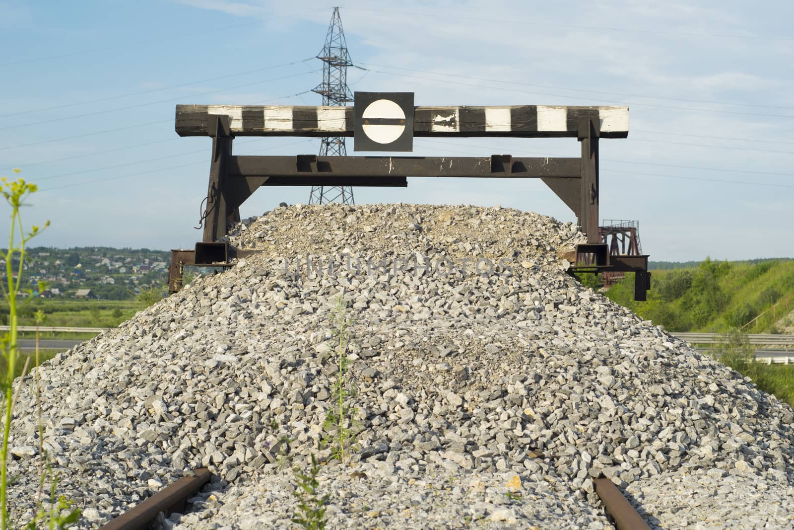 Railway impasse on the railroad tracks on the spring in Sunny weather