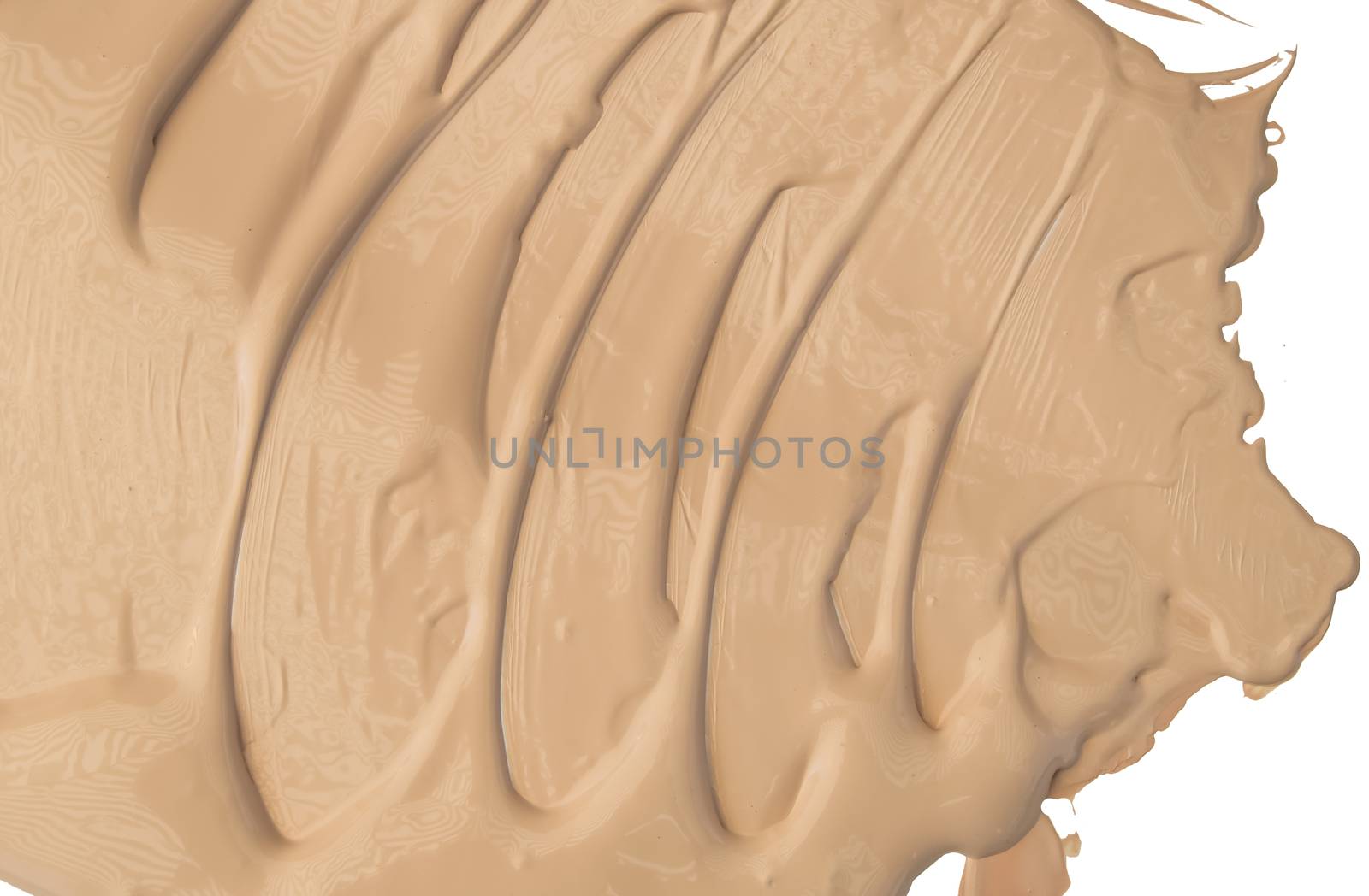 Smeared liquid Foundation isolated on a white background, make-up concept.