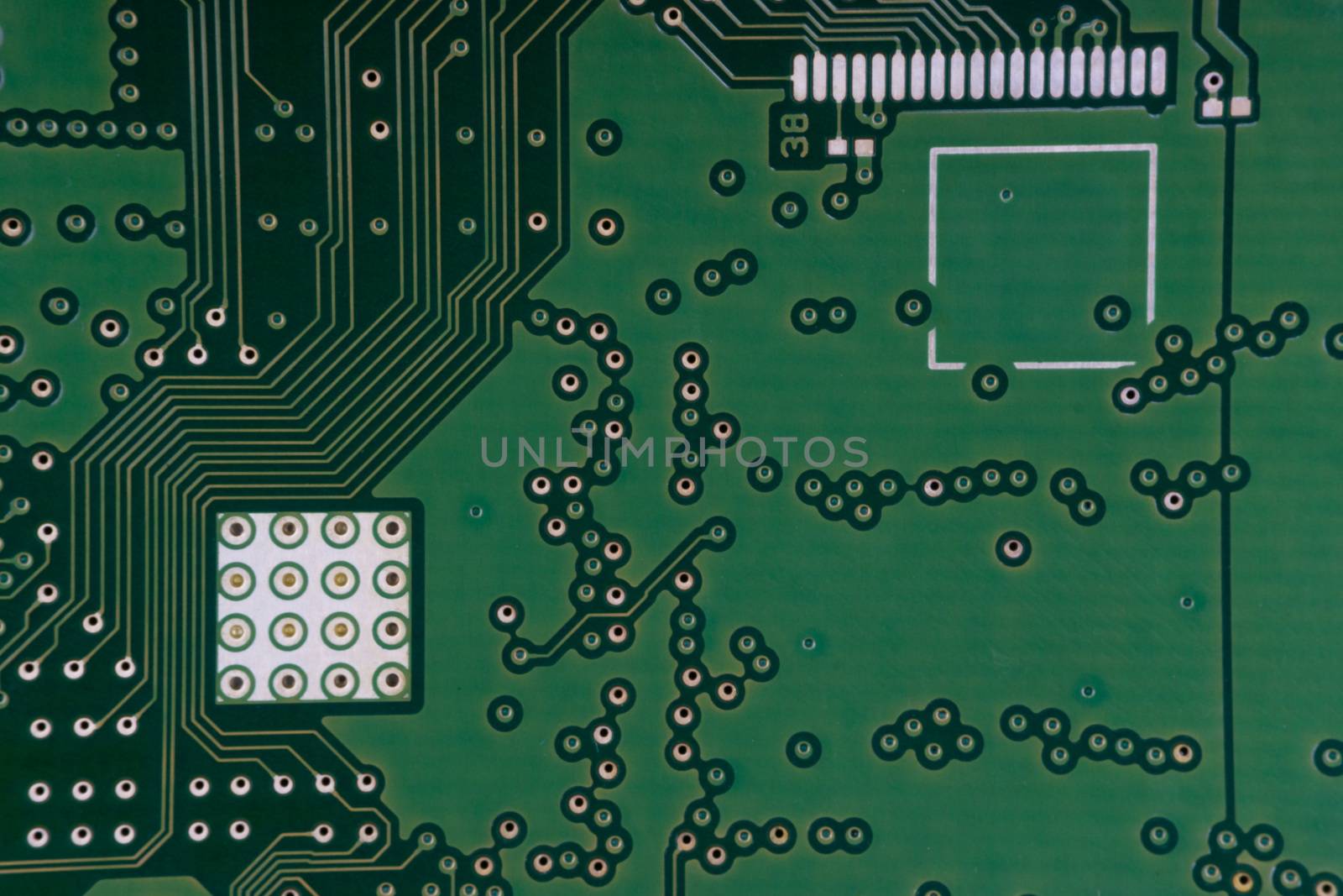 Electronic circuit board close up. Selective focus and crop fragment by silverwings