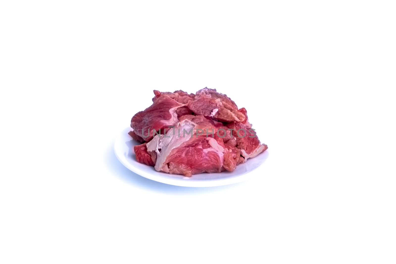 Fresh raw beef steak isolated on white background with selective focus