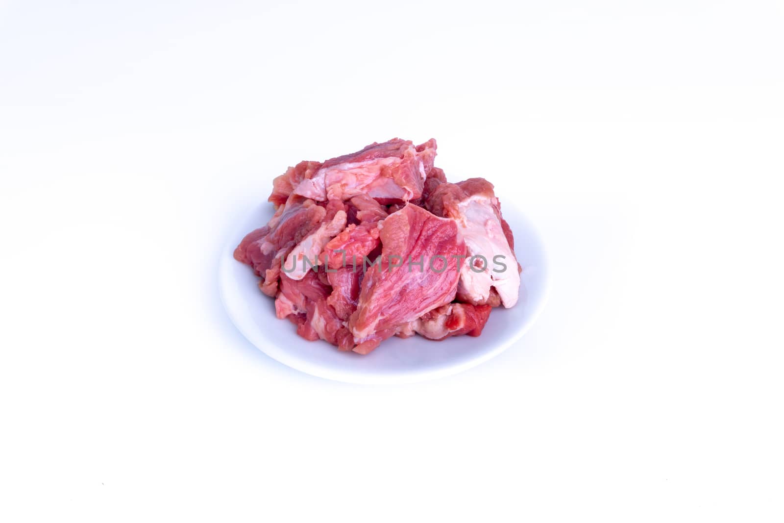 Fresh raw beef steak isolated on white background with selective focus