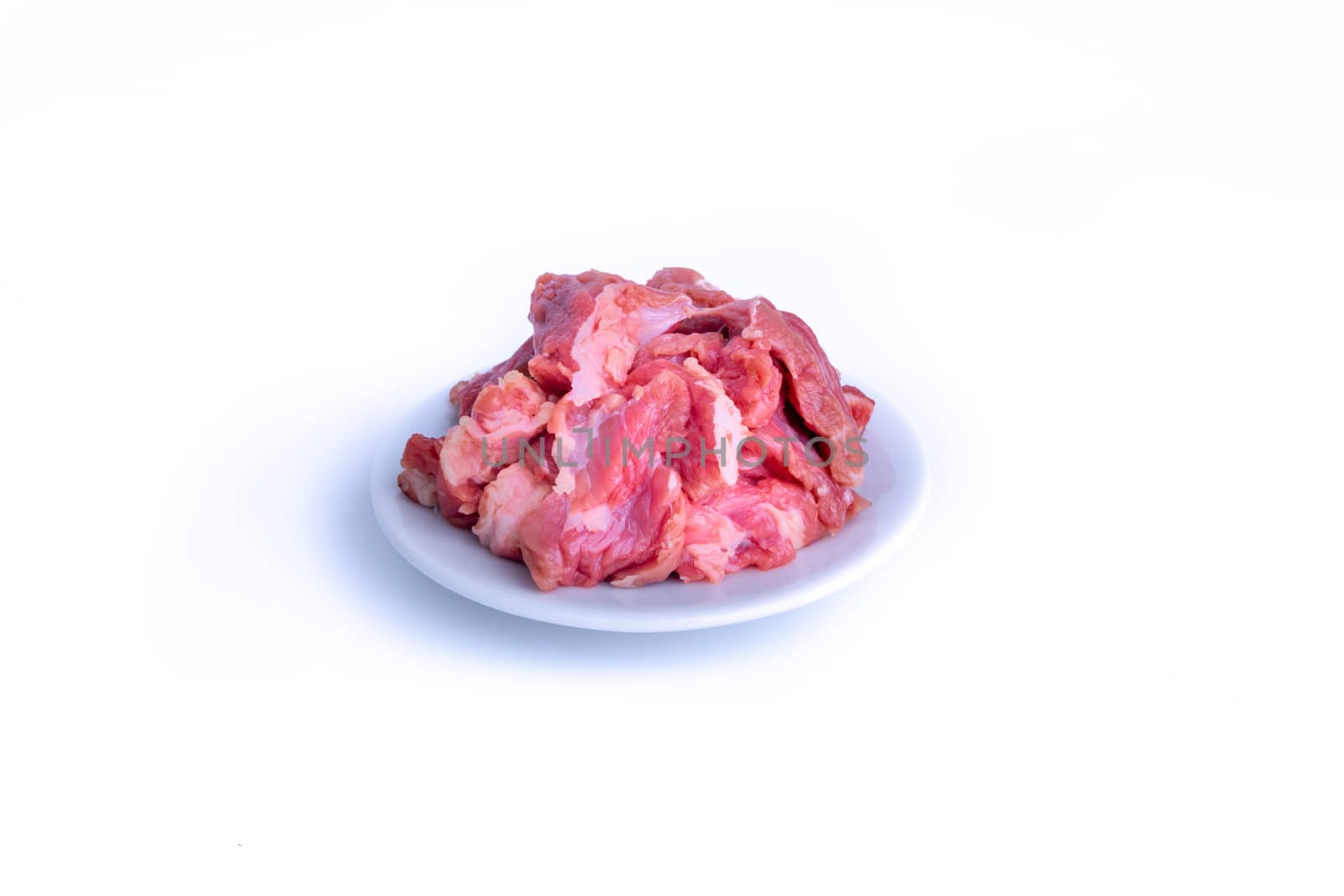 Fresh raw beef steak isolated on white background with selective focus