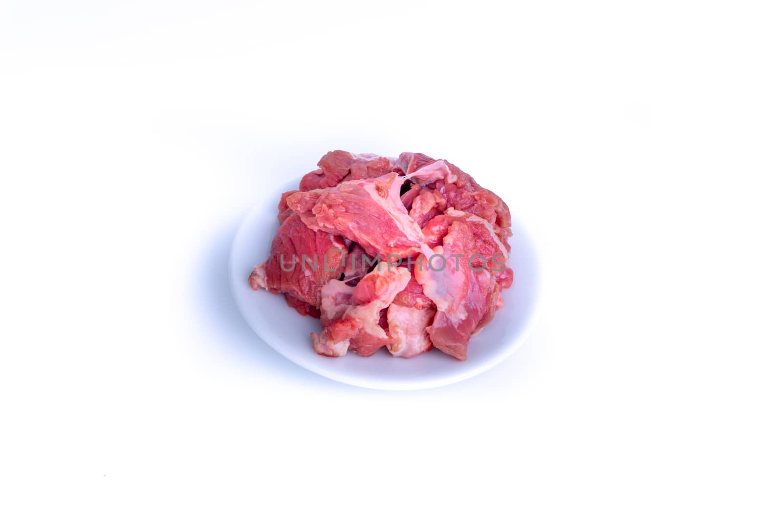 Fresh raw beef steak isolated on white background with selective focus