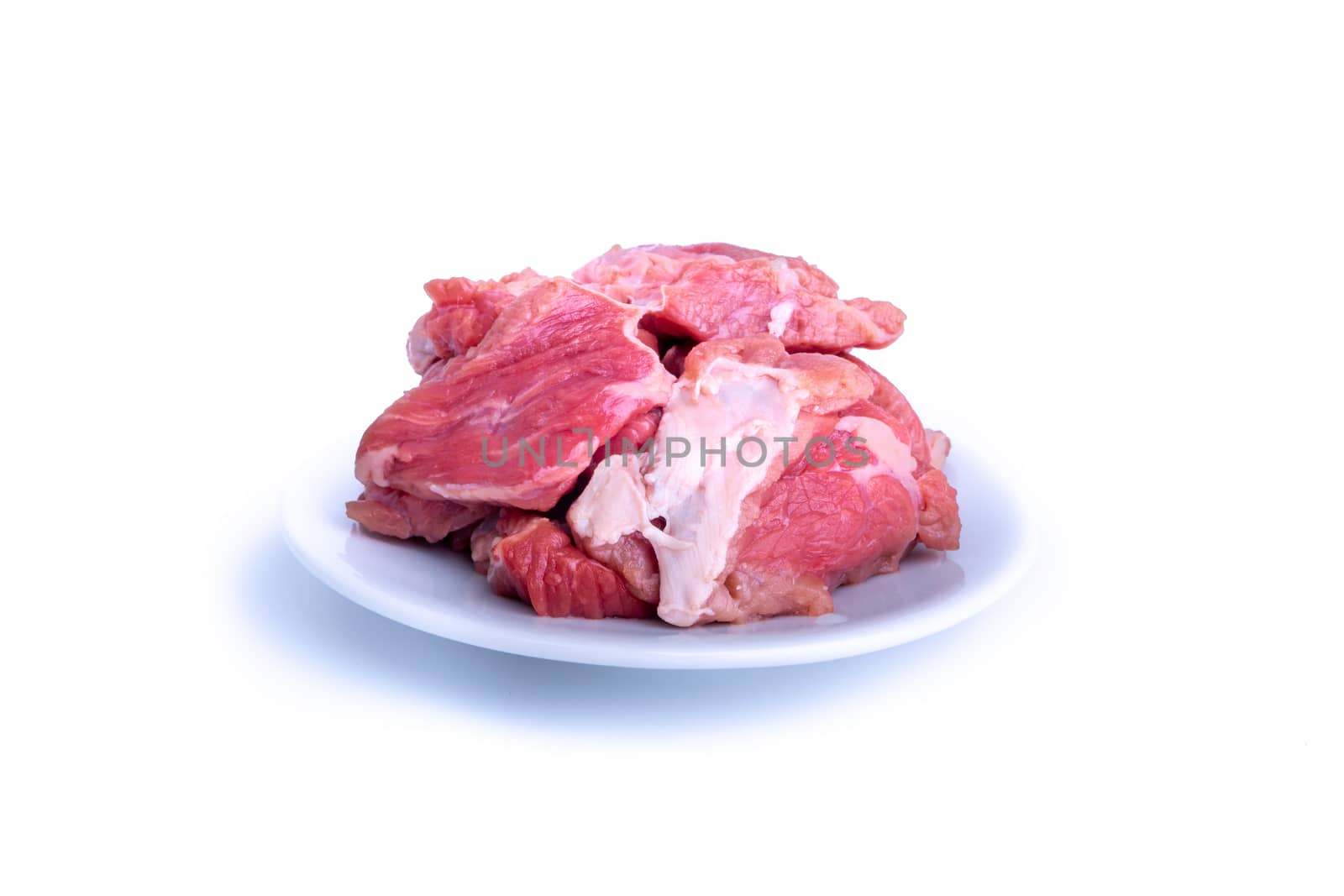 Fresh raw beef steak isolated on white background with selective focus
