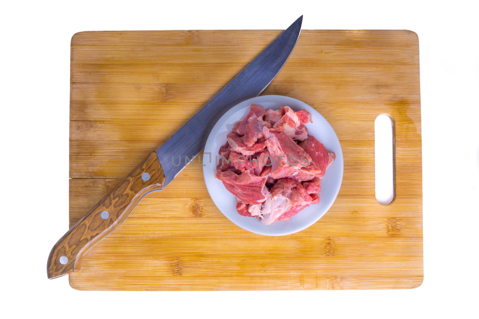 Fresh raw beef steak on wooden background with selective focus by silverwings