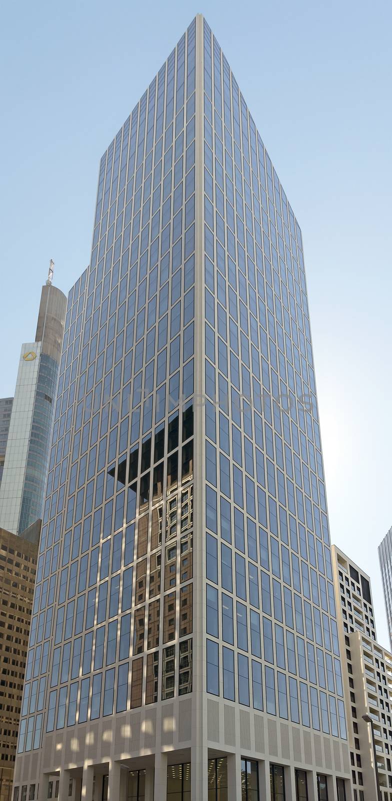 FRANKFURT AM MAIN, GERMANY - JULY 2, 2015: Skyscraper of Frankfurt am Main. Frankfurt is the fifth-largest city in Germany.

Frankfurt am Main, Germany - July 2, 2015: Skyscraper of Frankfurt am Main. Frankfurt is the fifth-largest city in Germany.