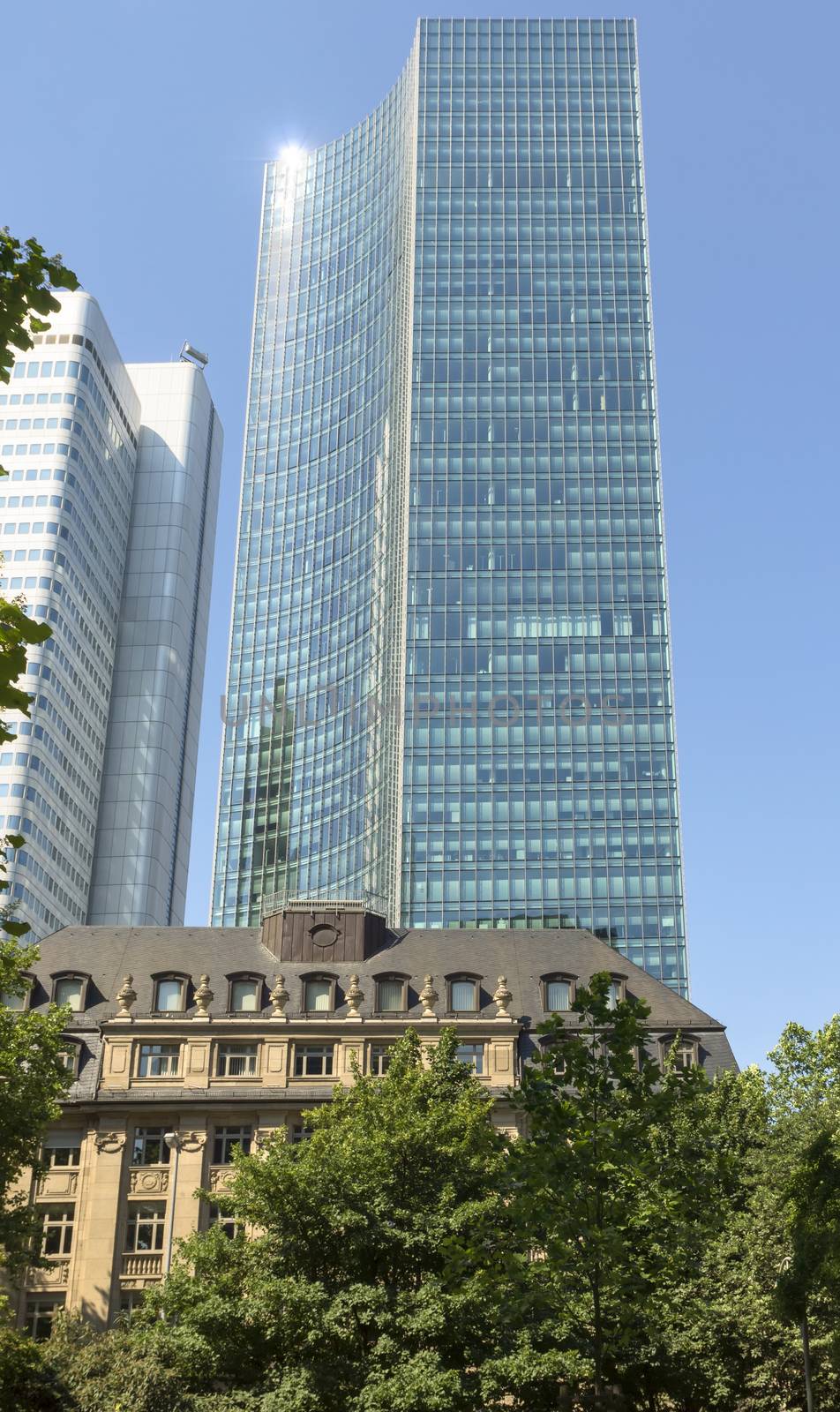 FRANKFURT AM MAIN, GERMANY - JULY 2, 2015: Skyscrapers of Frankfurt am Main. Frankfurt is the fifth-largest city in Germany.

Frankfurt am Main, Germany - July 2, 2015: Skyscrapers of Frankfurt am Main. Frankfurt is the fifth-largest city in Germany.