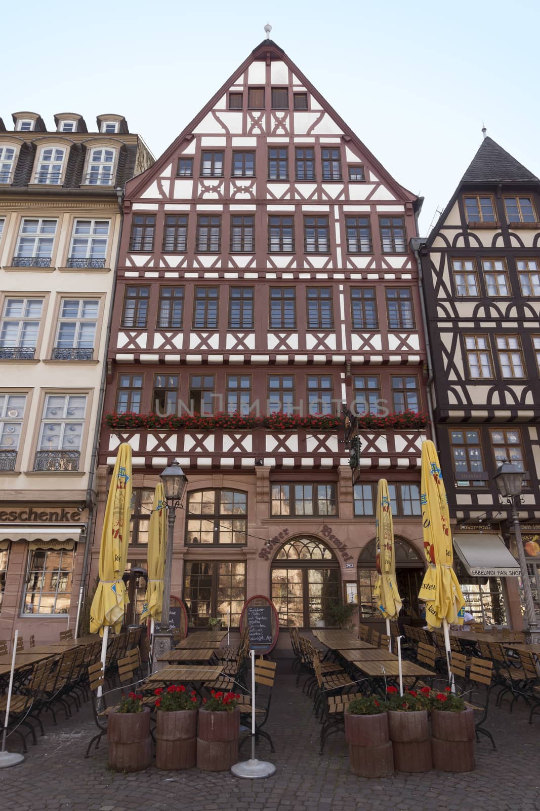 FRANKFURT AM MAIN, GERMANY - JULY 2, 2015: Buildings of Roemerberg square in Frankfurt, Germany. Frankfurt is the fifth-largest city in Germany.

Frankfurt am Main, Germany - July 2, 2015: Buildings of Roemerberg square in Frankfurt, Germany. Frankfurt is the fifth-largest city in Germany.