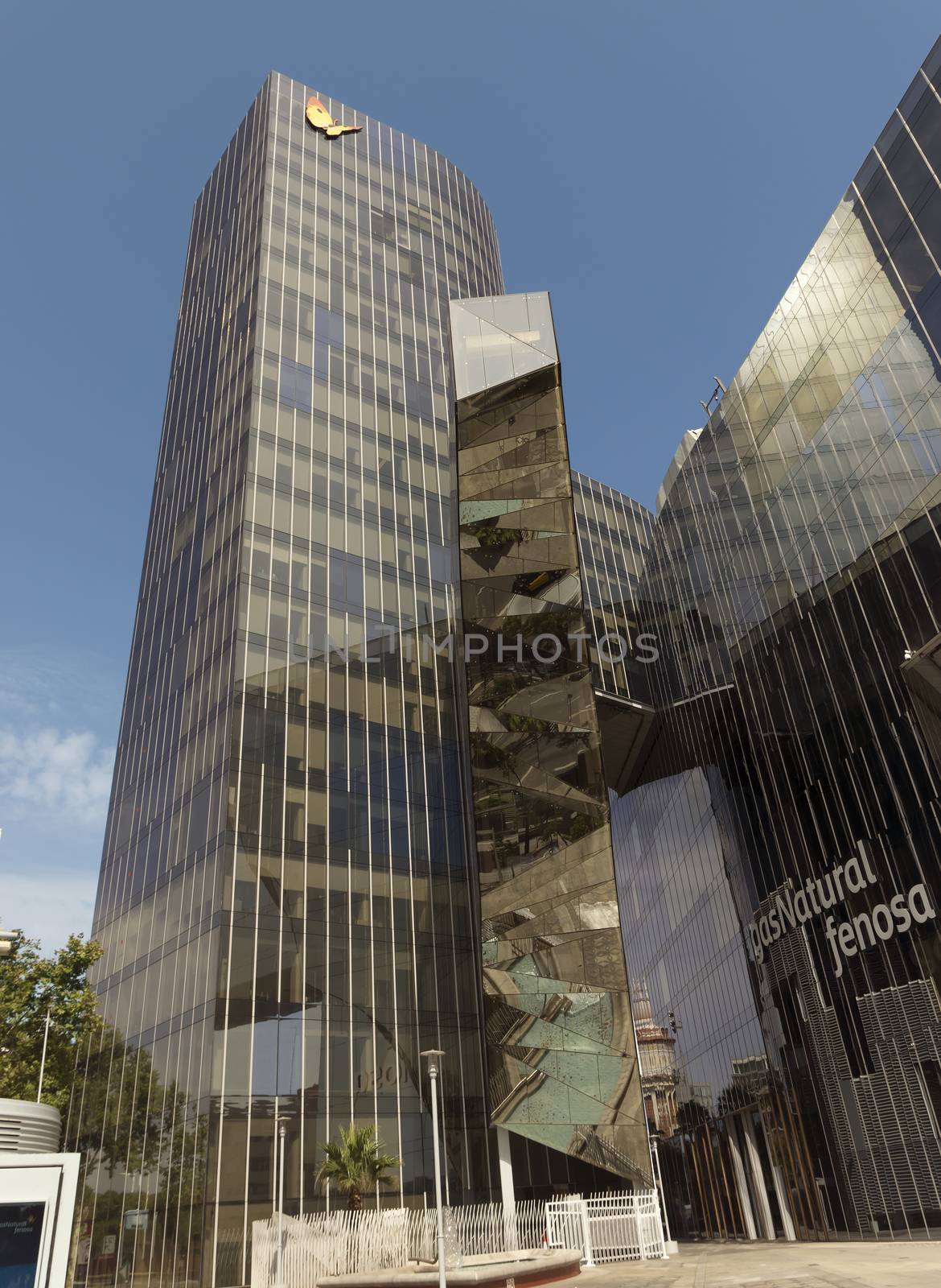 BARCELONA, SPAIN - JULY 4, 2015: Office building of Gas Natural fenosa is a Spanish natural gas utilities company. The firm is headquartered located in Barcelona.

Barcelona, Spain - July 4, 2015: Office building of Gas Natural fenosa is a Spanish natural gas utilities company. The firm is headquartered located in Barcelona.