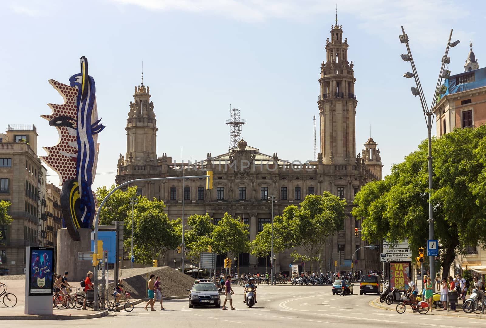BARCELONA, SPAIN - JULY 4, 2015: Architecture of port Vell in Barcelona, Spain.

Barcelona, Spain - July 4, 2015: Architecture of port Vell in Barcelona, Spain. People are walking by street.