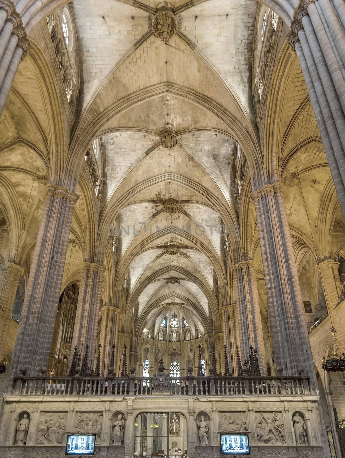 BARCELONA, SPAIN - JULY 6, 2015: Interior of Cathedral of the Holy Cross and Saint Eulalia, Barri Gothic Quarter, Barcelona, Catalonia.

Barcelona, Spain - July 6, 2015: Interior of Barcelona's gothic Cathedral, known as La Seu, located in the heart of the Gothic Quarter.