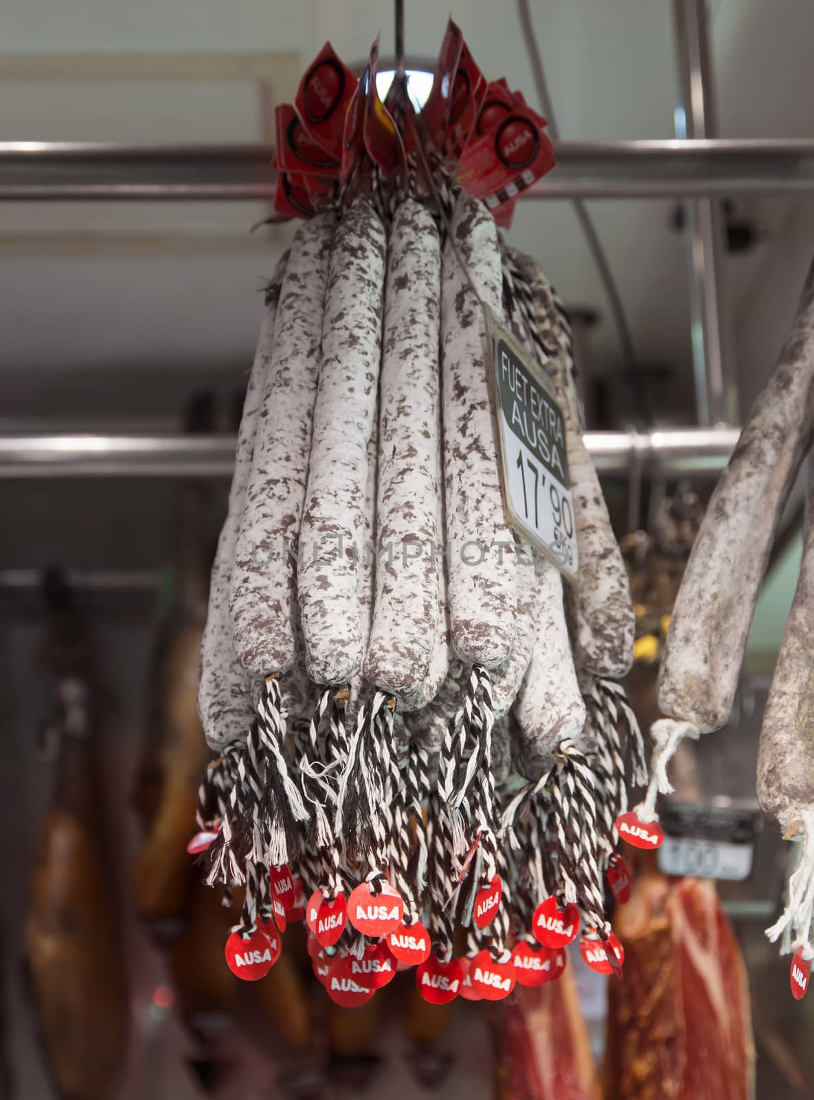 BARCELONA, SPAIN - JULY 6, 2015: Catalan dry sausages called fuet at Mercat de Sant Josep de la Boqueria market in Barcelona, Spain.

Barcelona, Spain - July 6, 2015: Catalan dry sausages called fuet at Mercat de Sant Josep de la Boqueria market in Barcelona, Spain.