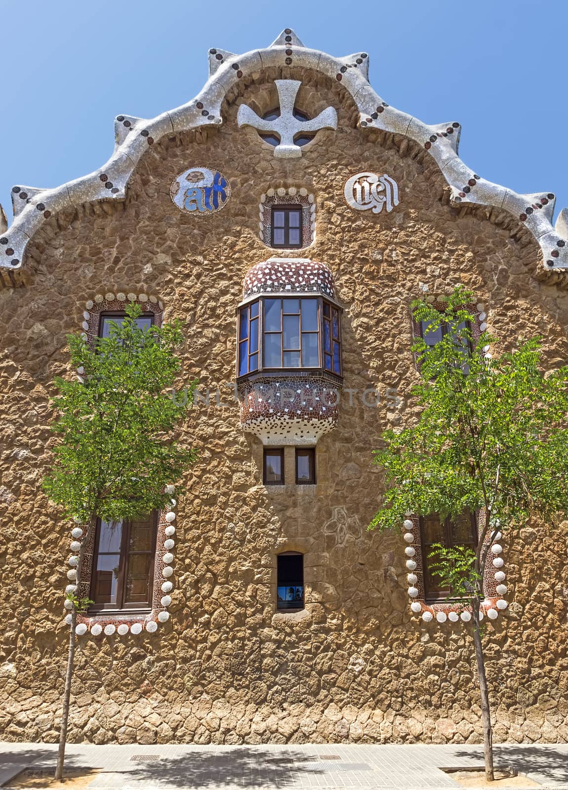 BARCELONA, SPAIN - JULY 6, 2015: Architecture of Park Guell by architect Antonio Gaudi.

Barcelona, Spain - July 6, 2015: Architecture of Park Guell by architect Antonio Gaudi.