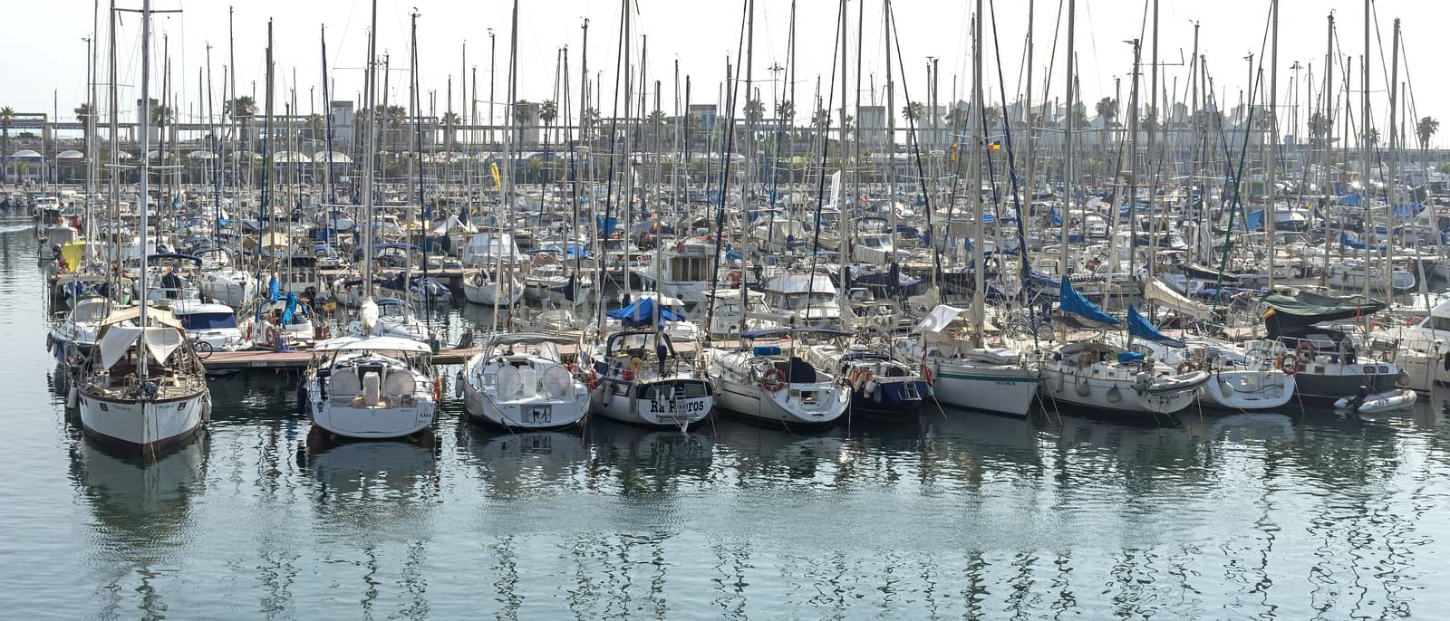 BARCELONA, SPAIN - JULY 12, 2015: Yachts and sailboats in Port Vell marina in Barcelona, Catalonia, Spain. This port one of the old ports of Barcelona.

Barcelona, Spain - July 12, 2015: Yachts and sailboats in Port Vell marina in Barcelona, Catalonia, Spain. This port one of the old ports of Barcelona.