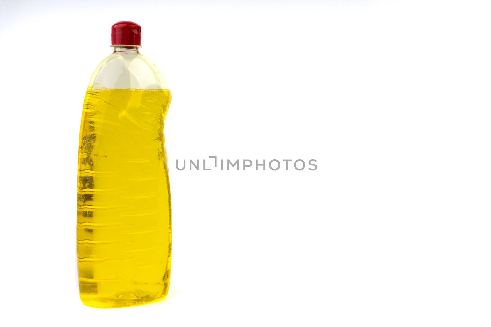 Dishwashing liquid detergent or soap in plastic bottle isolated on white background. Selective focus and copy space concept