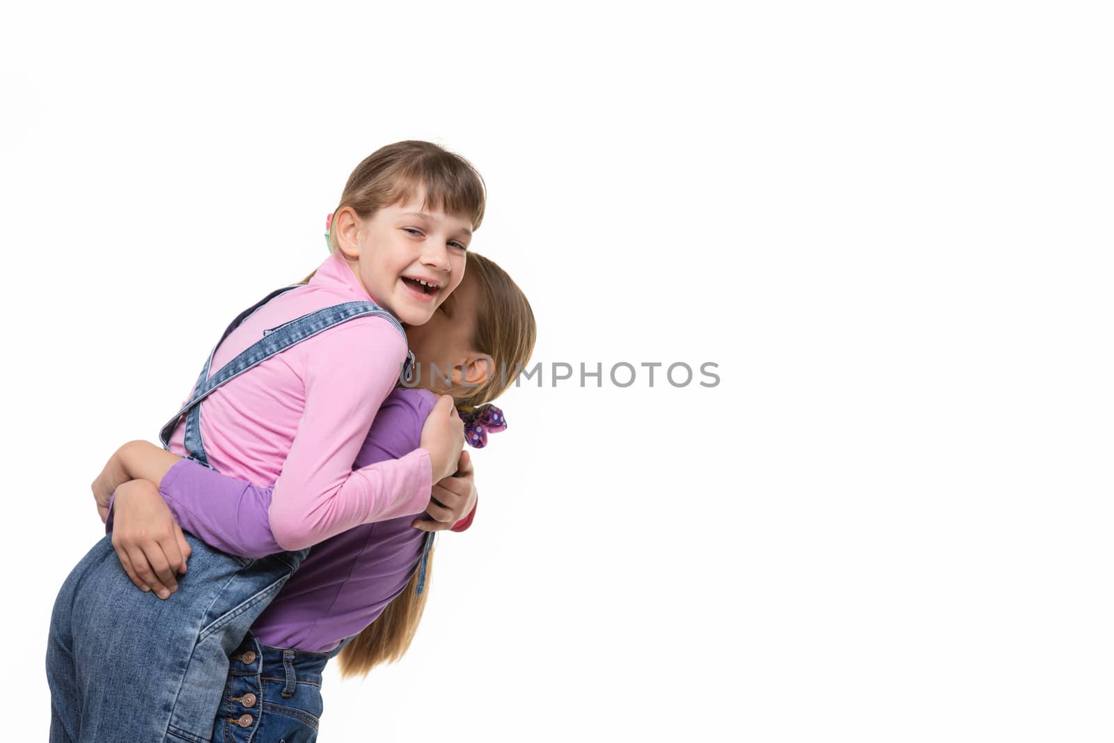 Girl happily hugged her beloved a girlfriend