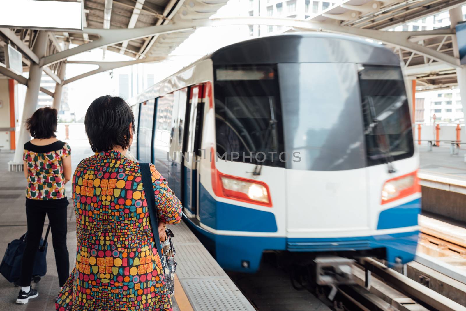 Bangkok, Thailand - January 17, 2018 : BTS skytrain train runs in Bangkok. Many people in Bangkok used skytrain to save time.