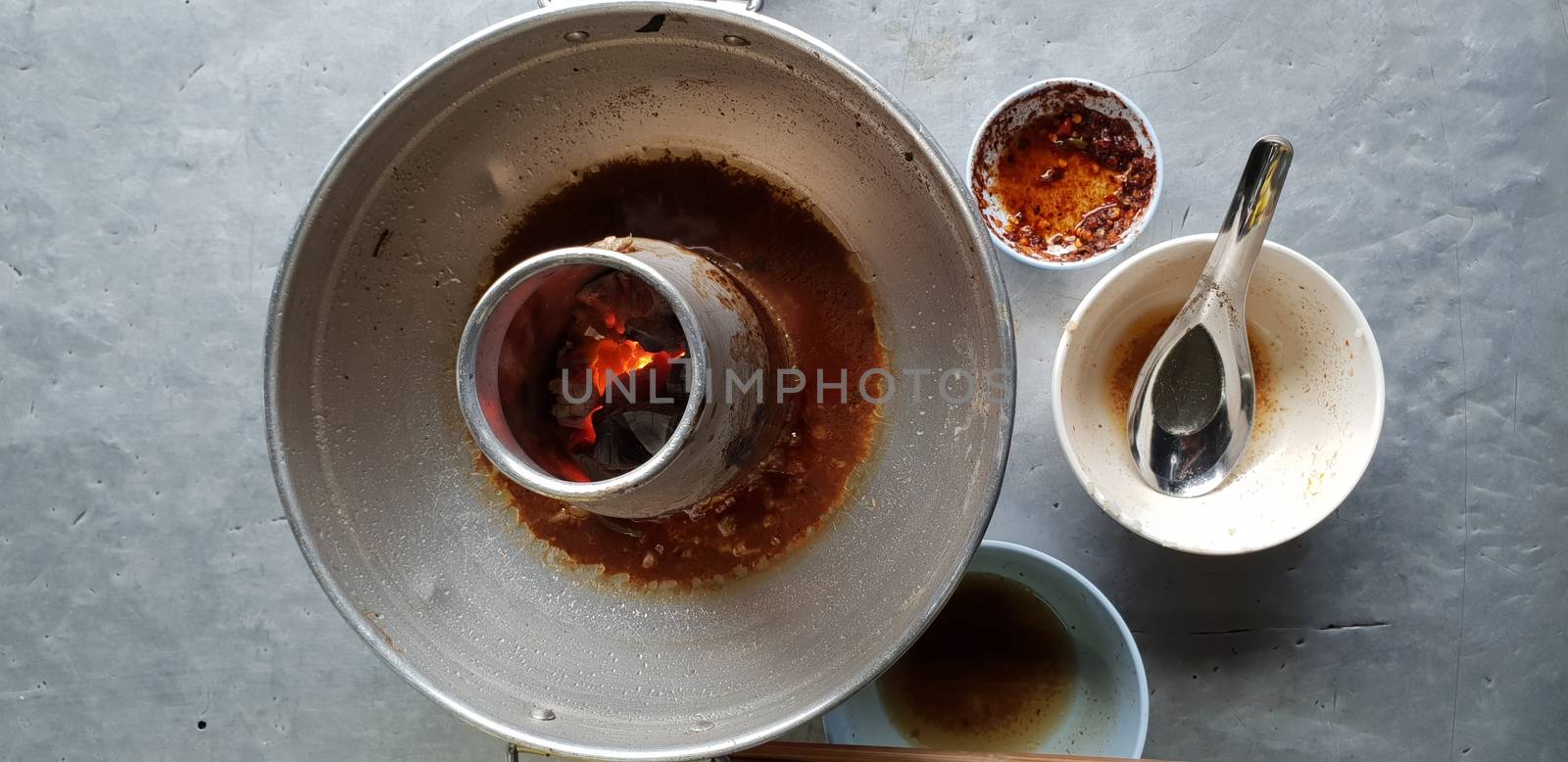 Braised beef clear with meat tendon soup stew (Ekaehla meat) with vegetable in hot pot for sale at Thai street food market or restaurant in Thailand