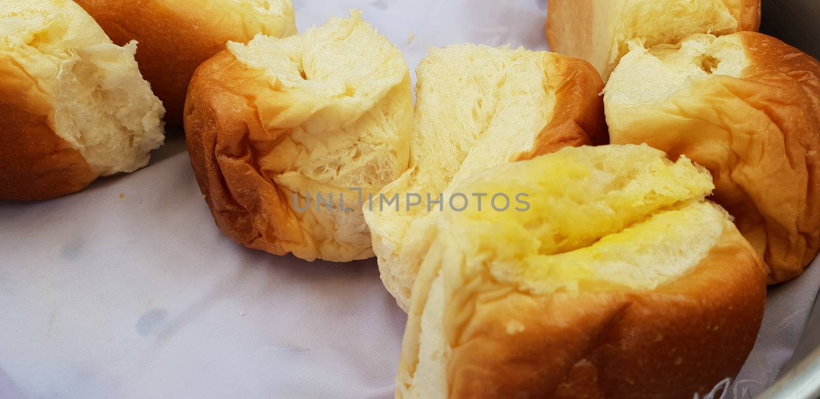 Steamed Butter Buns at food market or restaurant by PongMoji