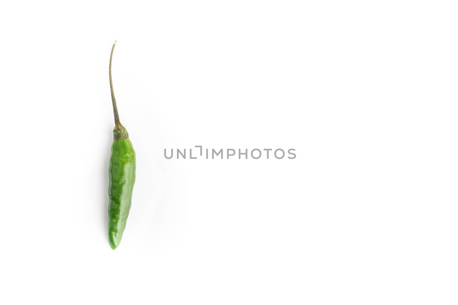 Green BirdÕs eye chili,Thai Chili pepper ,bird chili pepper nature isolate on white background. Selective focus and crop fragment