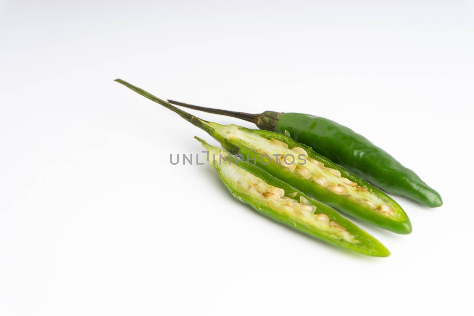 Green BirdÕs eye chili,Thai Chili pepper ,bird chili pepper nature isolate on white background. Selective focus and crop fragment