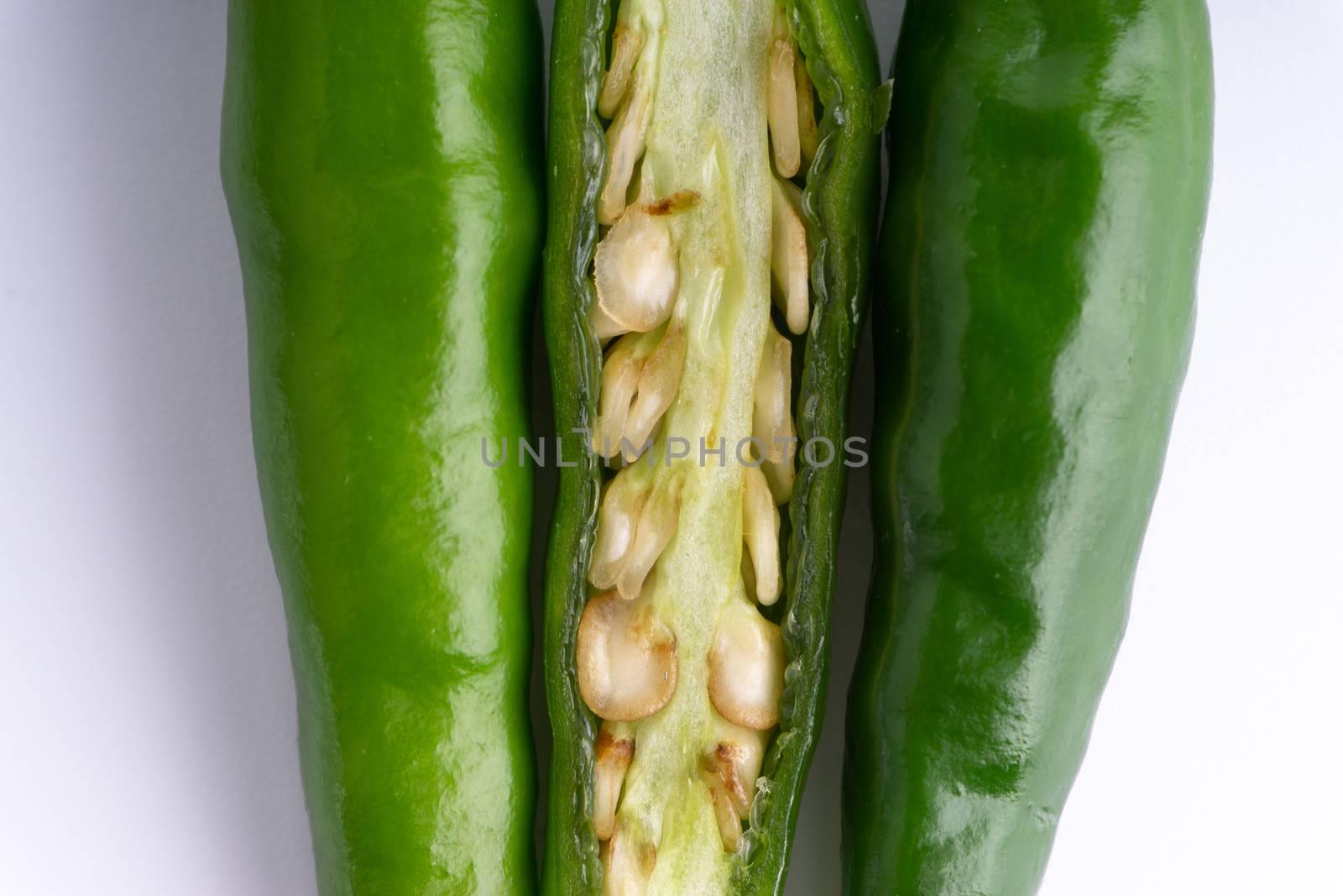 Green BirdÕs eye chili,Thai Chili pepper ,bird chili pepper nature isolate on white background. Selective focus and crop fragment