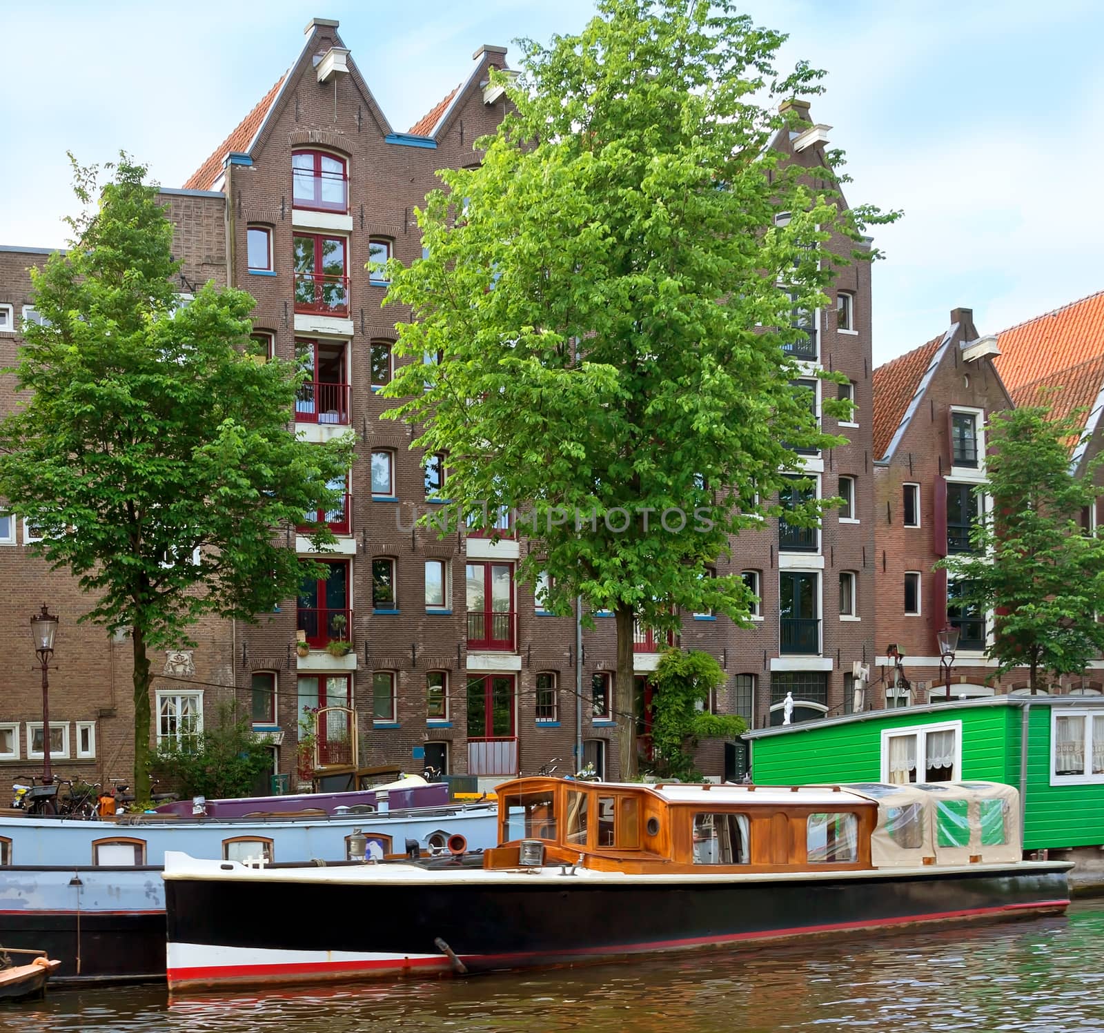 View of Amsterdam canals and typical dutch houses.