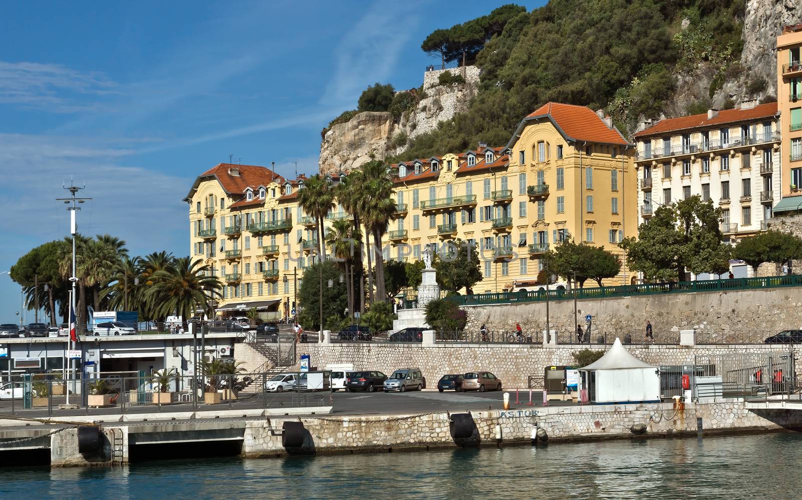 NICE, FRANCE - JUNE 5, 2014: Architecture of city in the Port de Nice in French Riviera. Port de Nice was started in 1745.

Nice, France - June 5, 2014: Architecture of city in the Port de Nice in French Riviera. Port de Nice was started in 1745.